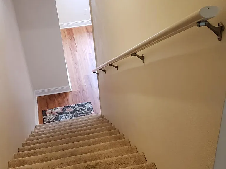 New Carpet on stairs. This is the only carpet in the home. All other floors wood and tile.