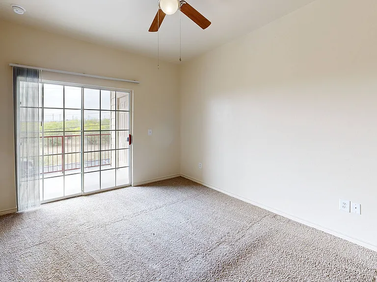 Spacious Living Room with Natural Light at Willowbend Apartments in San Antonio, TX