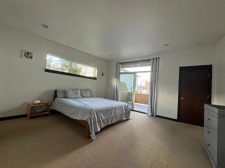 3rd Floor: Primary Bedroom. King bed is shown.