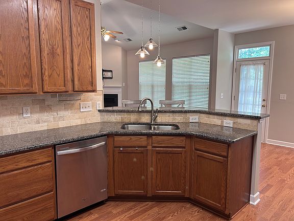 Granite countertops, deep double sink.