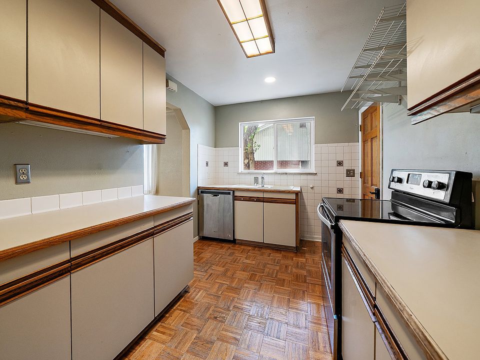 Full kitchen with tons of storage and nice counter space. Southern facing window over sink.