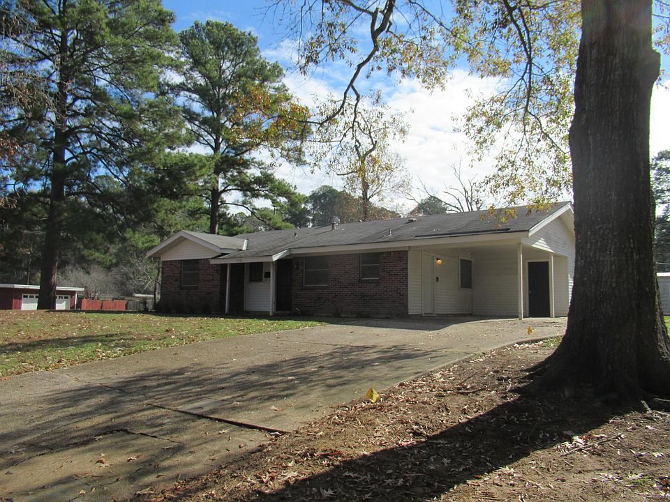 Corner lot. One car carport.