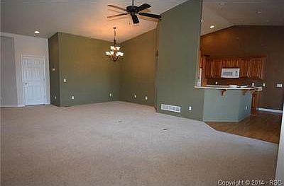 Great Room with Dining Area in center and Eating Space to the ri