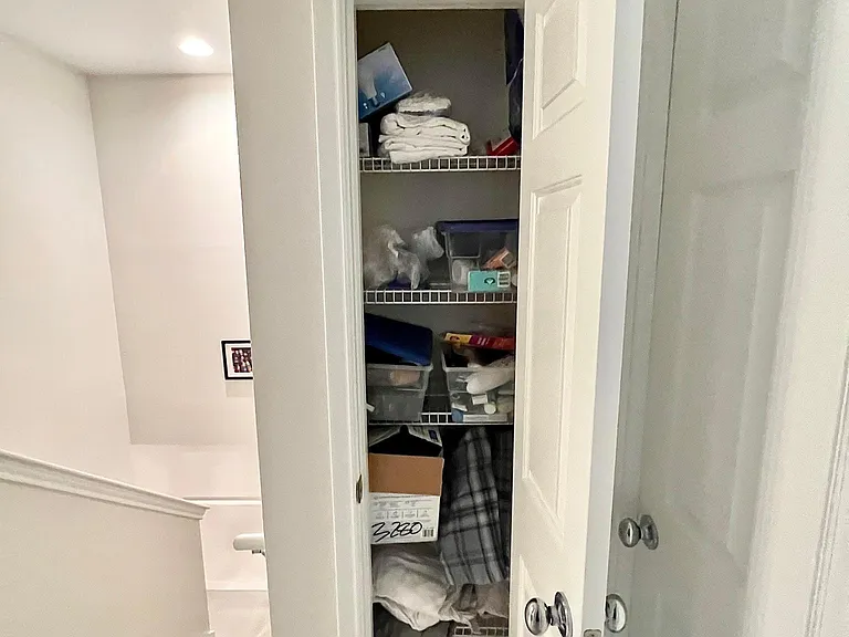 Linen closet on the 2nd floor. This condo has ample closet space!