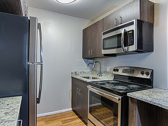 Renovated kitchens are available in select homes, featuring granite countertops and stainless steel appliances