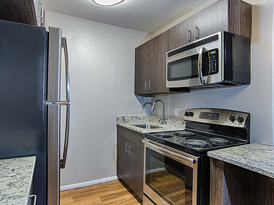 Renovated kitchens are available in select homes, featuring granite countertops and stainless steel appliances