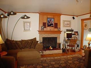 Living Room with Fireplace & Hardwood Floors