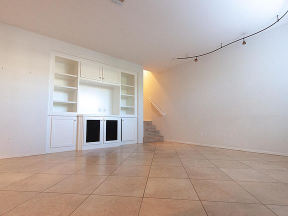 Family room with built in entertainment cabinets