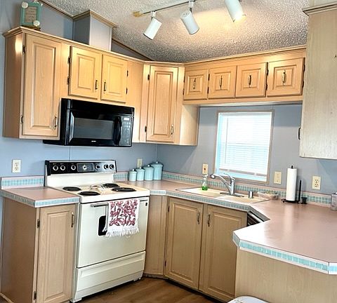 Kitchen offers lots of storage and counter space