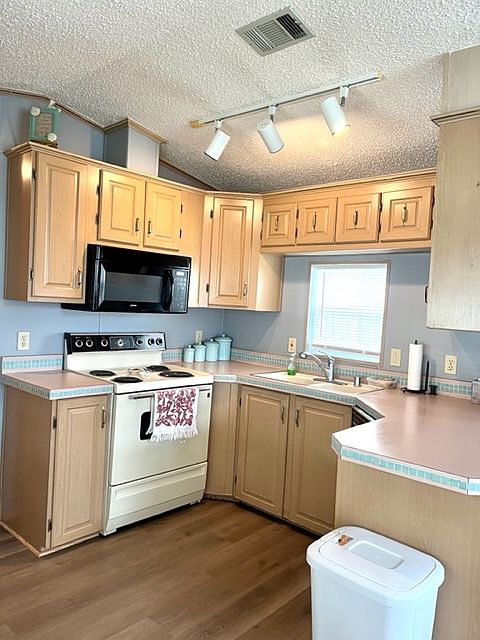Kitchen offers lots of storage and counter space