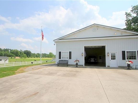 This detached garage has to be seen to be appreciated.  There is a full guest quarters including bedroom, full bath and kitchene