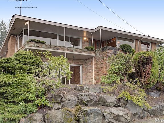 This midcentury home has a beautiful tiered look that gives it great curb appeal