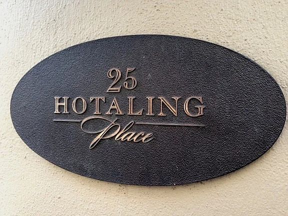 Charming historic address marker at 25 Hotaling Place, set in a quiet, story-filled alley in the heart of the city.