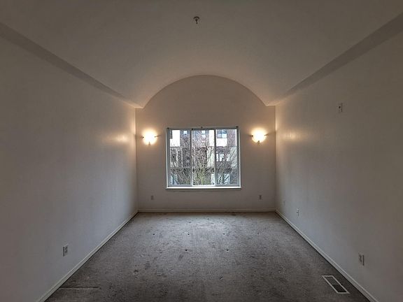 Master bedroom with vaulted ceiling