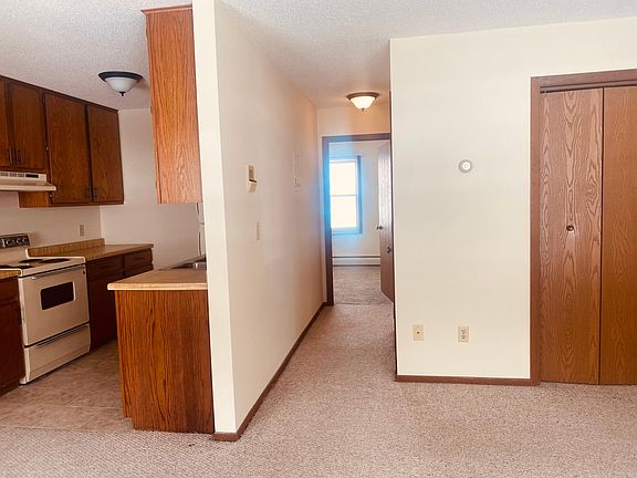 Hall to bedrooms, kitchen, entry closet. View from main room.