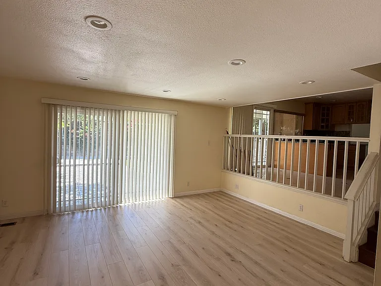 Same Family room with new wooden flooring