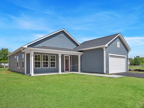 2 car garage with rear entry and covered back porch.