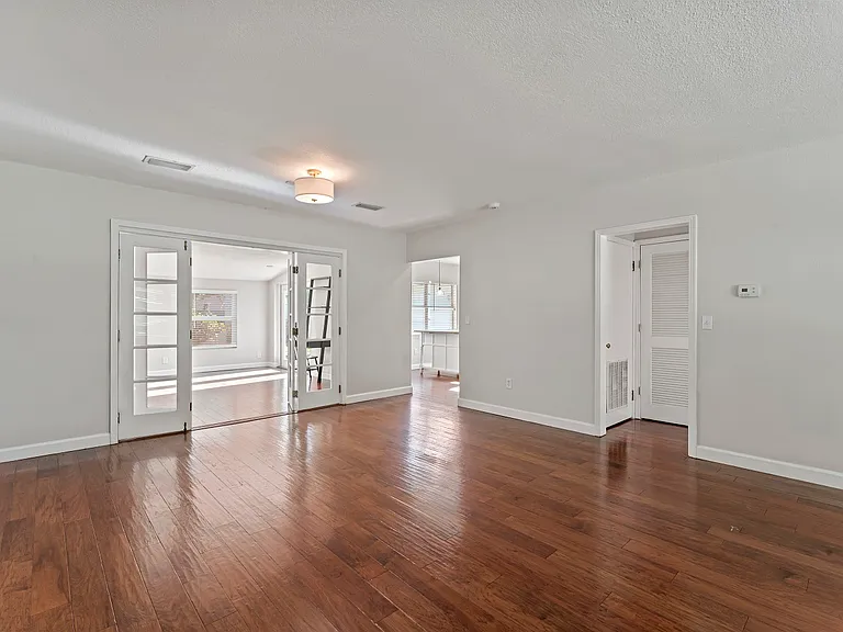 Living and Dining area Looking into the Family Room and Kitchen