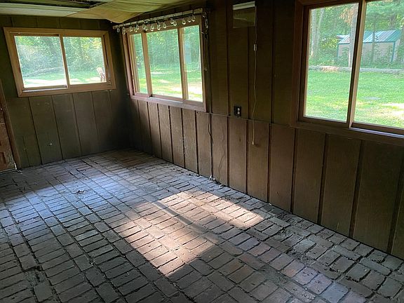 Bonus enclosed patio with lots of light and great views!