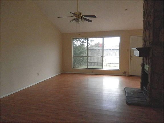 As you enter, you'll see you have a large living area.