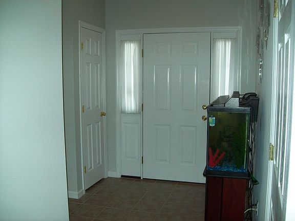 Foyer with ceramic tile