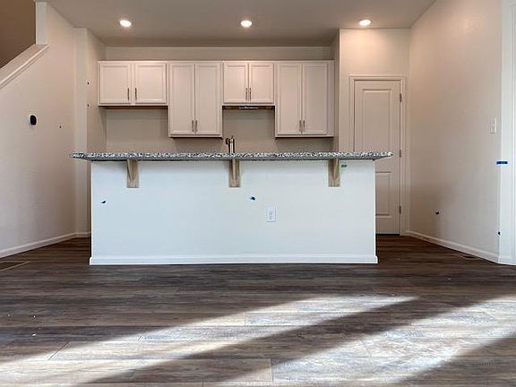 Kitchen, before stainless steel appliances are installed. Gas stove.