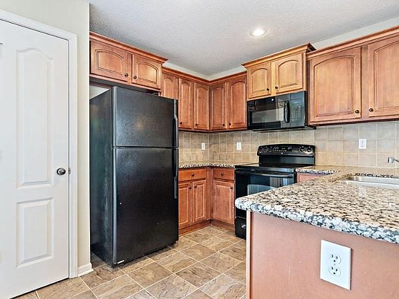 4th image of 4320 N 106th Ter