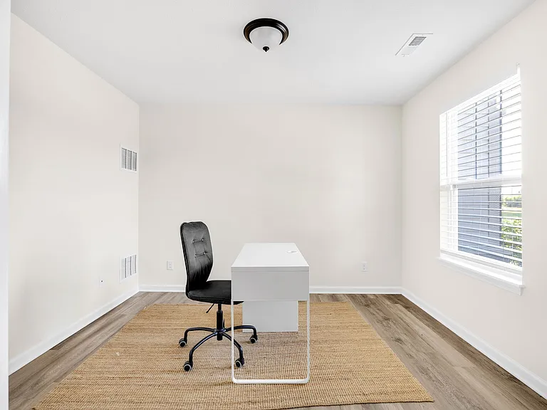 Office space or a perfect in-home gym space located on the ground floor.