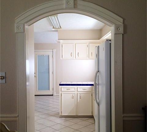 Kitchen open to formal dining room & breakfast nook.