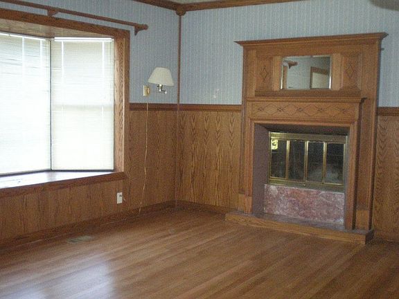 Living room with window box and fireplace