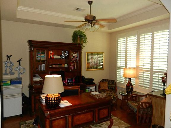 Study off the foyer.  Crown moulding and hardwood floors