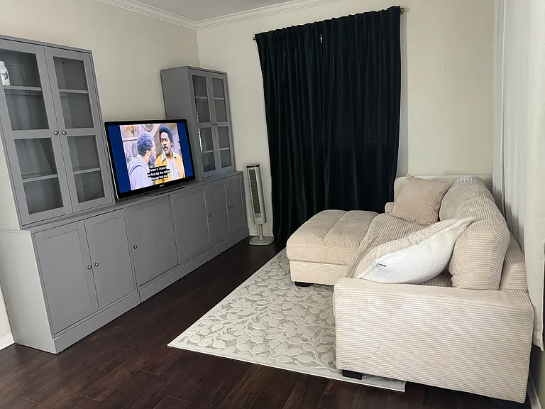 living room with easy maintenance laminate flooring .