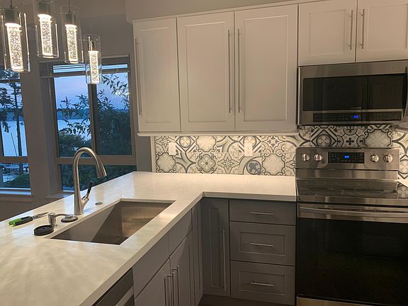 chefs kitchen with ss appliances