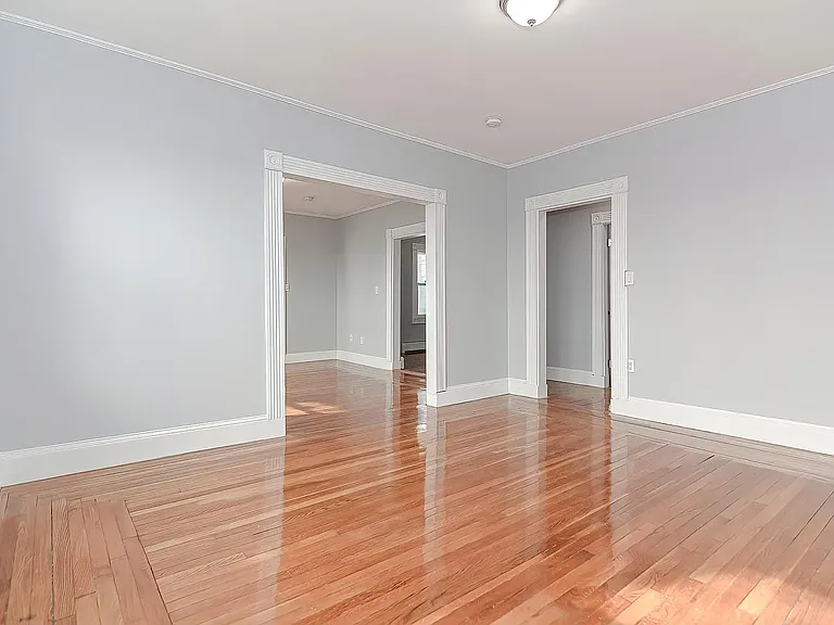 dining room looking into living room and hallway