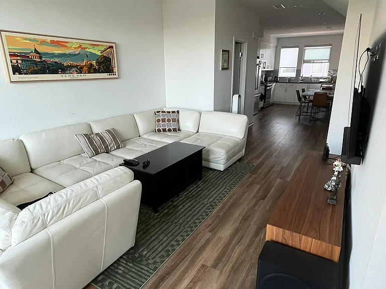 Furnished living room alternate angle