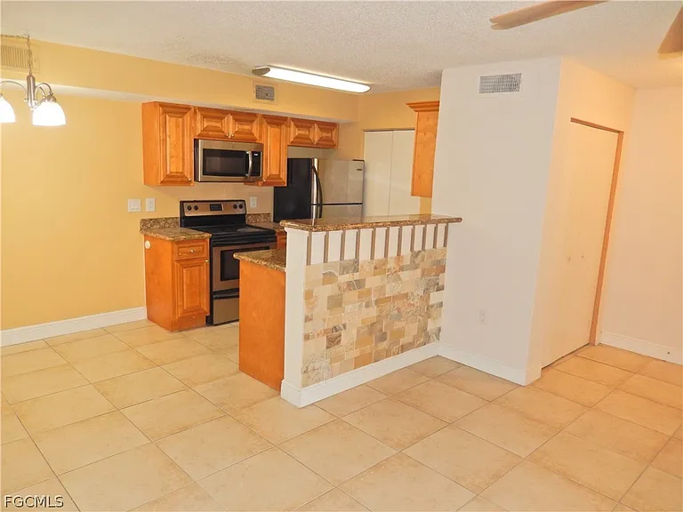 12560 Equestrian Cir #1311 — Photo 5