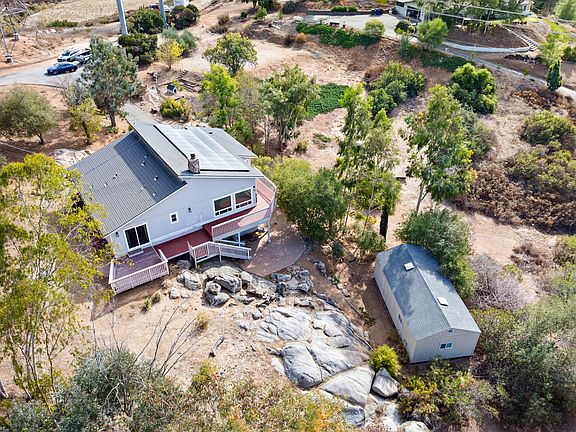 Aerial of back of house and detached utility room