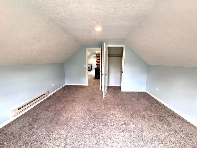 Large bedroom and closet.