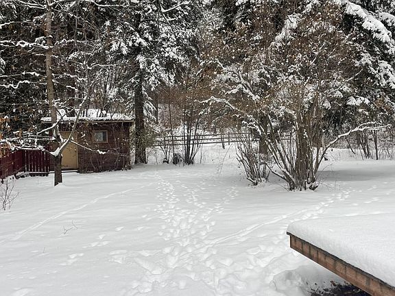 View from front entry looking into backyard. Garden shed.