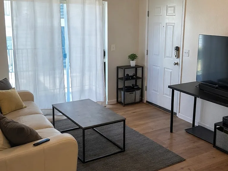1645 NE Merman Dr #303 — Photo 1