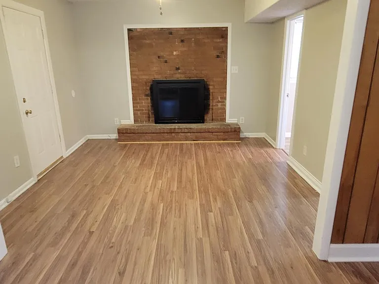 downstairs 2 room family room or could be used as 4th bedroom with ceiling fans, laundry room and 2 closets