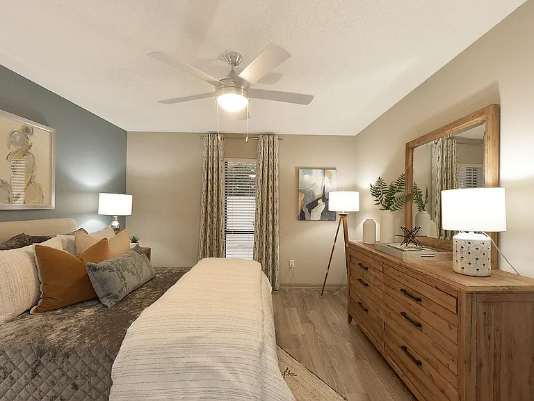 Bedroom with hardwood-style flooring