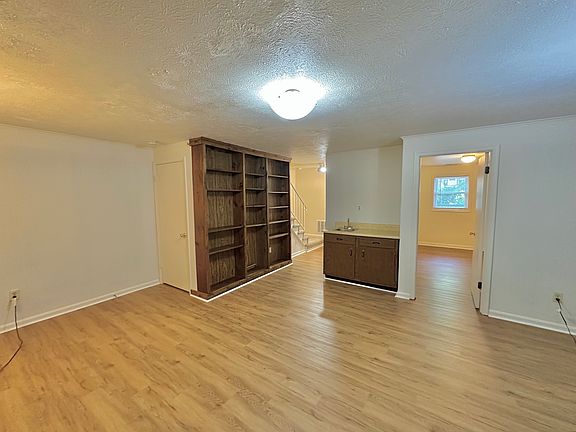Family room, built in bookcases and wet bar
