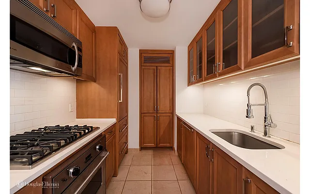 Sold by Douglas Elliman | media 36