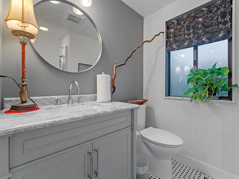 Downstairs bathroom off the family room and kitchen. 'Has a small shower