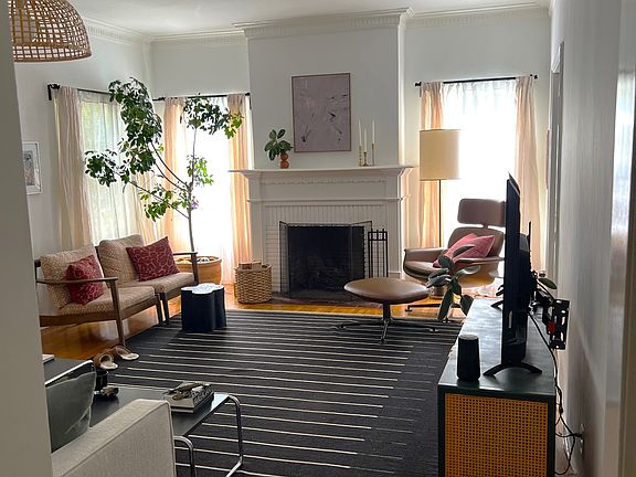 Staged Living Room with Wood Burning Fireplace