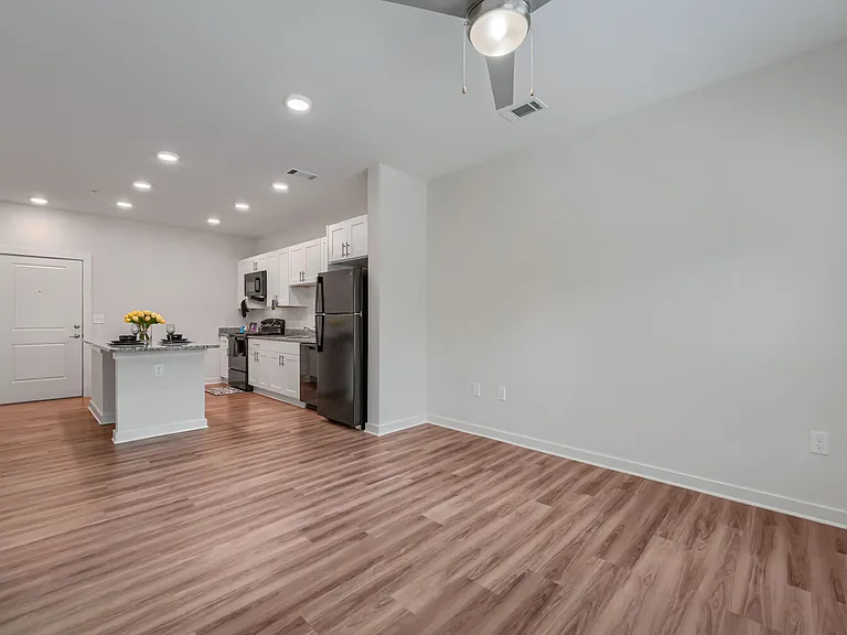 Living room with view of kitchen