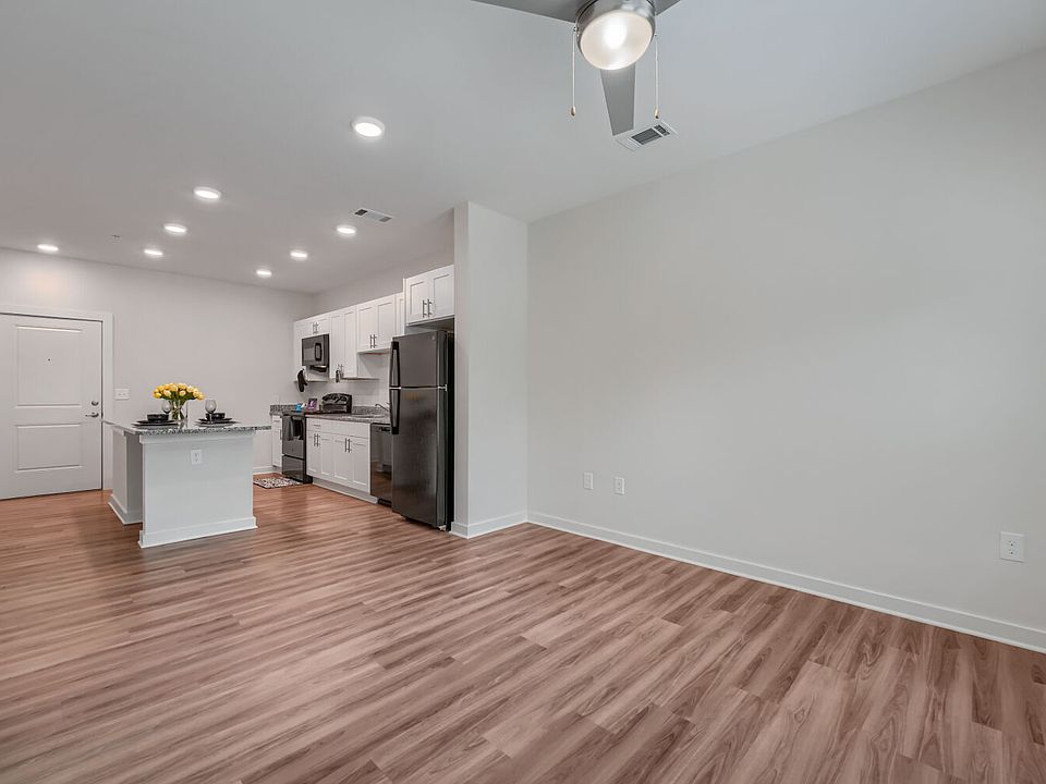 Living room with view of kitchen