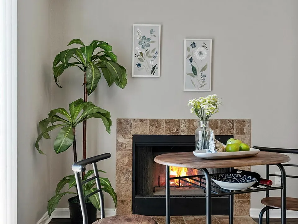 Driscoll Place | Beautiful Fireplace & Dining Area