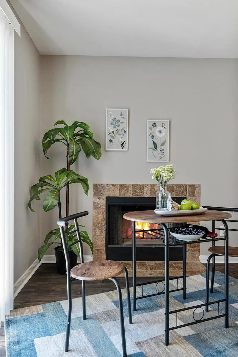 Driscoll Place | Beautiful Fireplace & Dining Area - Driscoll Place Apartments